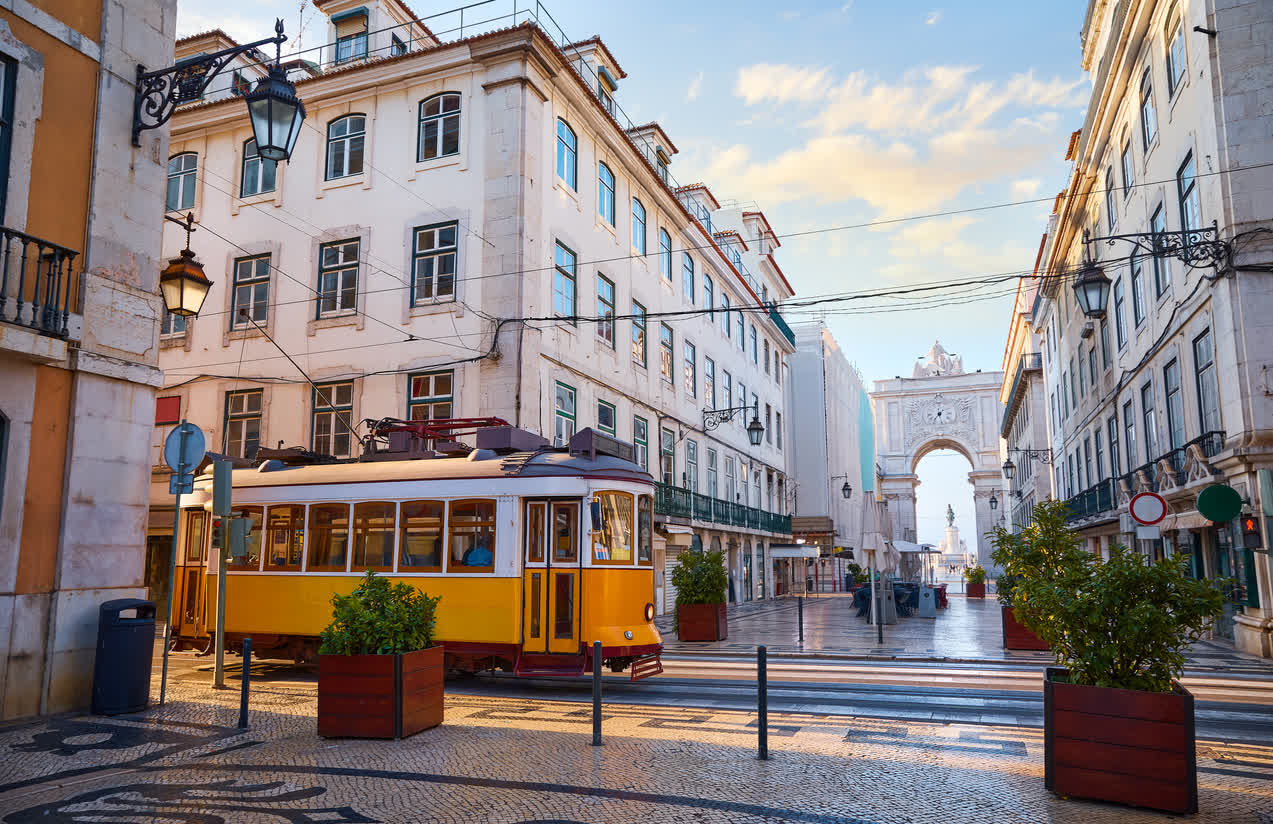 Yellow tram on a Lisbon street near the hotel