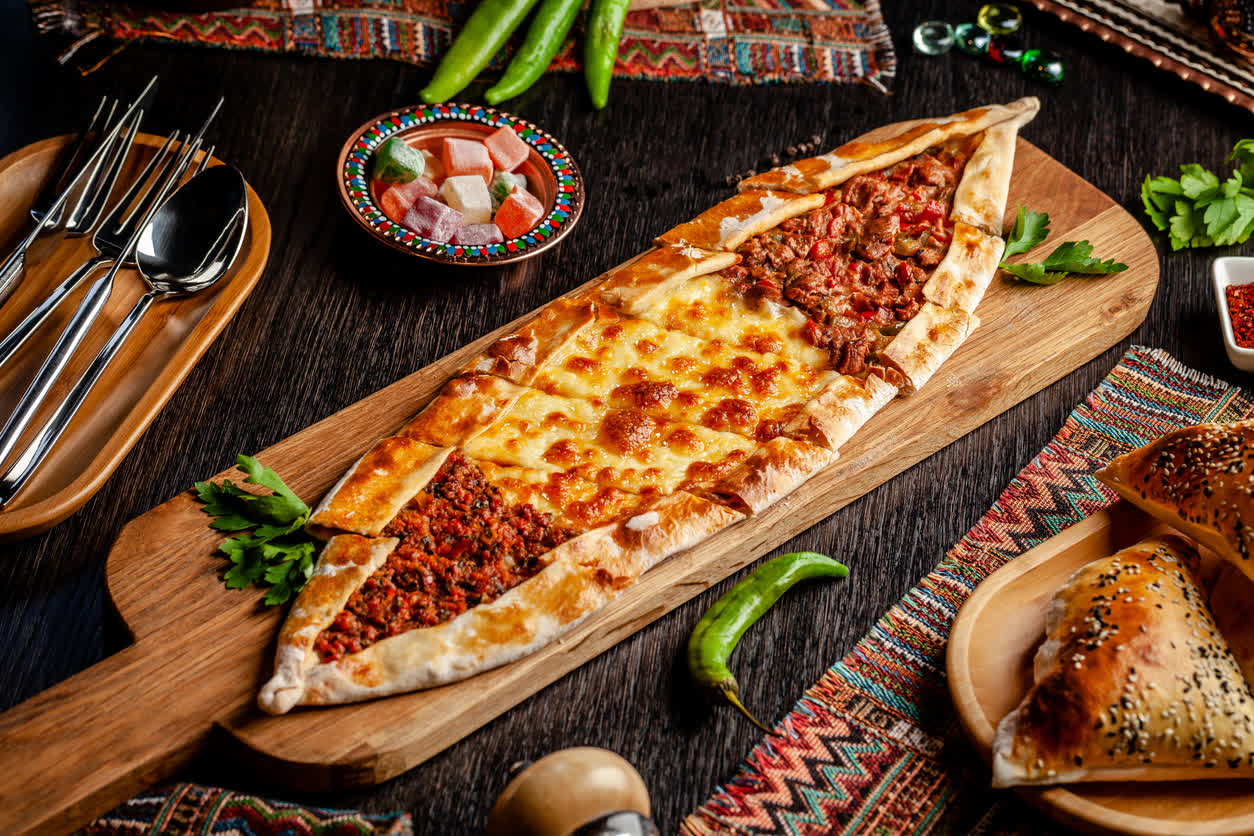 Turkish pide served on a wooden board